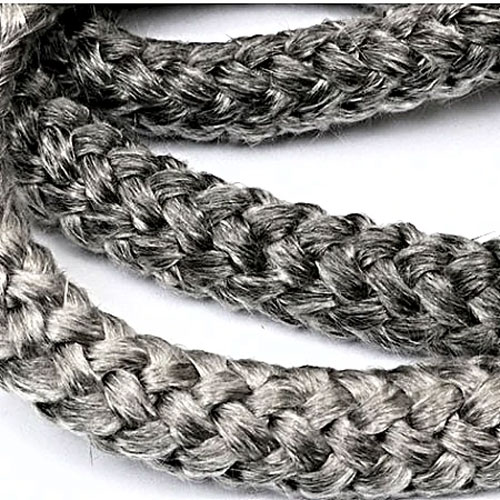 Close up of the braid lay on a fiberglass oven door sealing rope that gives the rope its elasticity