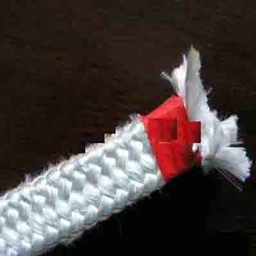 End of a fiberglass furnace door sealing rope taped before cutting to stop the braid unravelling